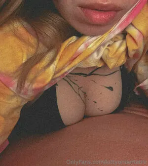 Kittyundertable Thumbnail Picture
